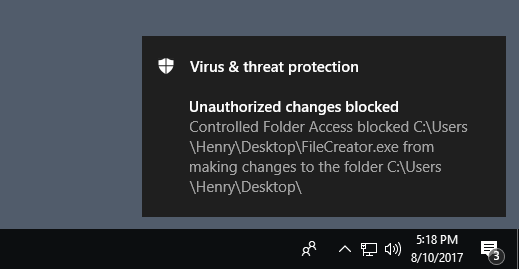 Exampke notification that says Unauthorized changes blocked: Controlled folder access blocked (file name) from making changes to the folder (folder name)
