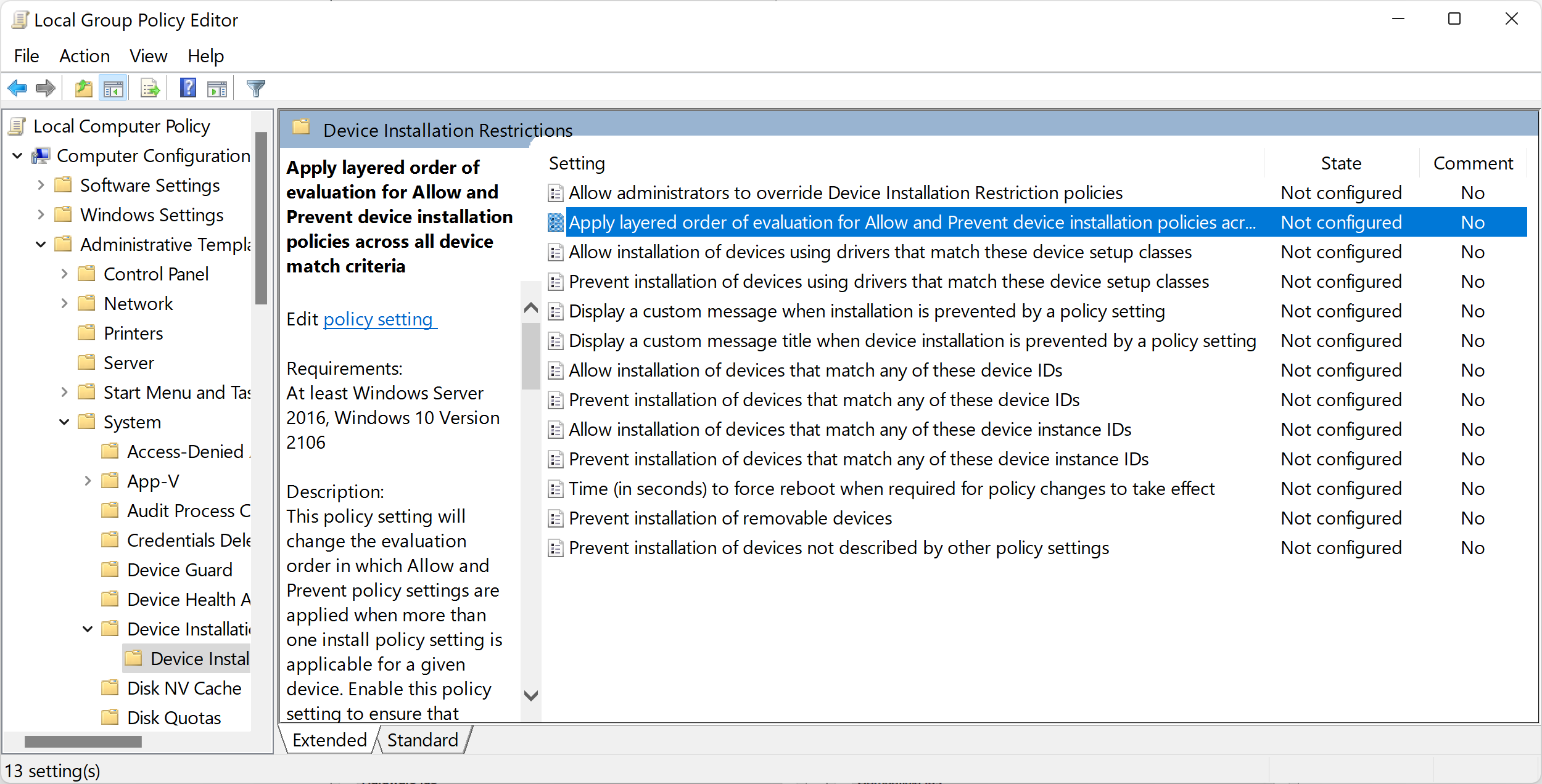 Image of Local Group Policy Editor that shows the policies under "Device Installation Restrictions" and the policy named in this step.
